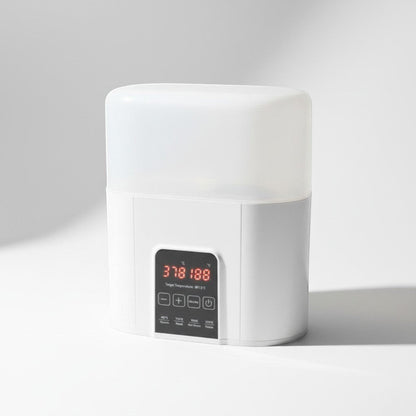 Peek Ah Boo white 4-in-1 baby bottle warmer and sterilizer with digital display and touch controls.
