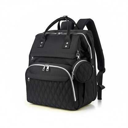 Peek Ah Boo black multifunctional diaper bag backpack with quilted front, USB port, and expandable travel bassinet.