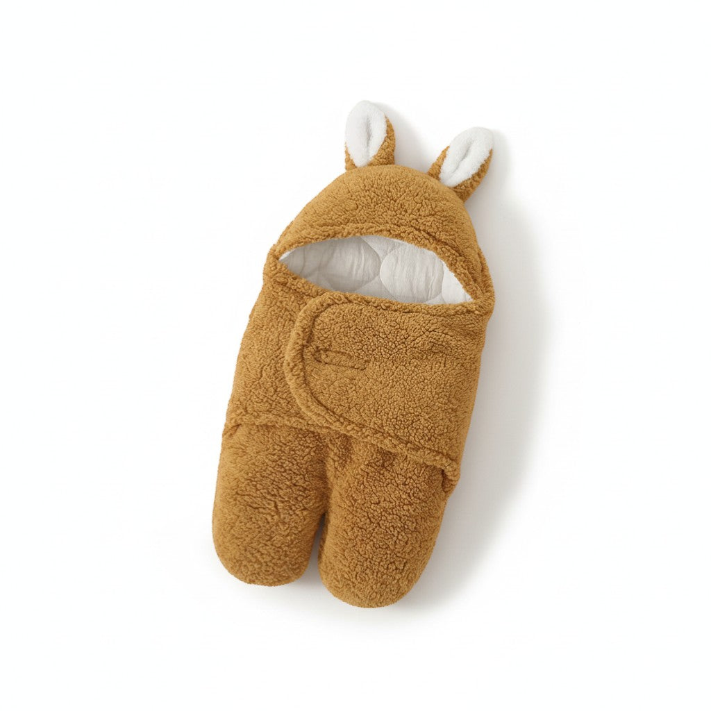 Peek Ah Boo plush faux cashmere baby sleeping bag in caramel brown with bear ears and white lining. Features a secure wrap closure.