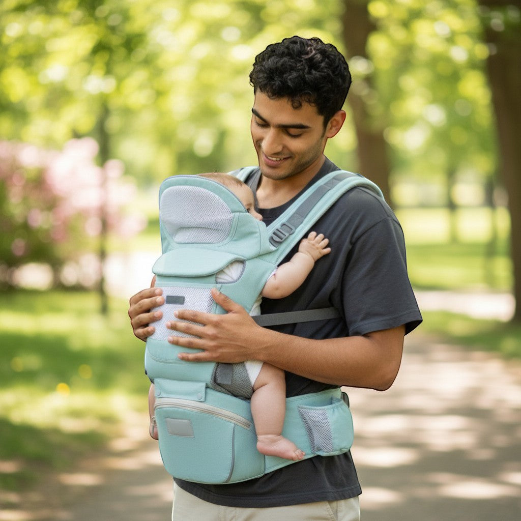 Peek Ah Boo 3-in-1 baby carrier with ergonomic waist stool in ice star green, made of breathable cotton and mesh.