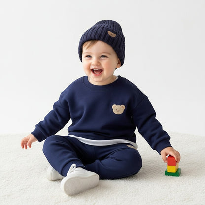 Peek Ah Boo navy blue fleece tracksuit with embroidered teddy bear detail and matching ribbed beanie.