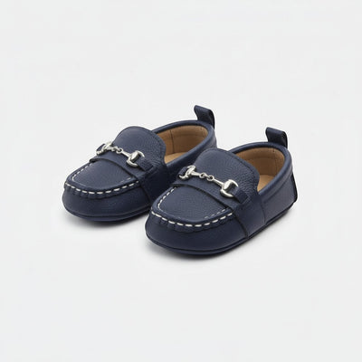 Peek Ah Boo navy blue leather baby loafers with silver bit detail and white stitching. Elasticated opening for easy wear.