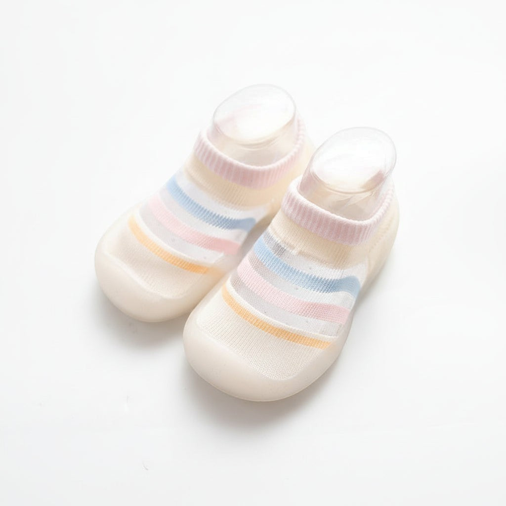 Peek Ah Boo non-slip knit baby shoes with pastel stripes and rubber soles. Ideal for early walkers.