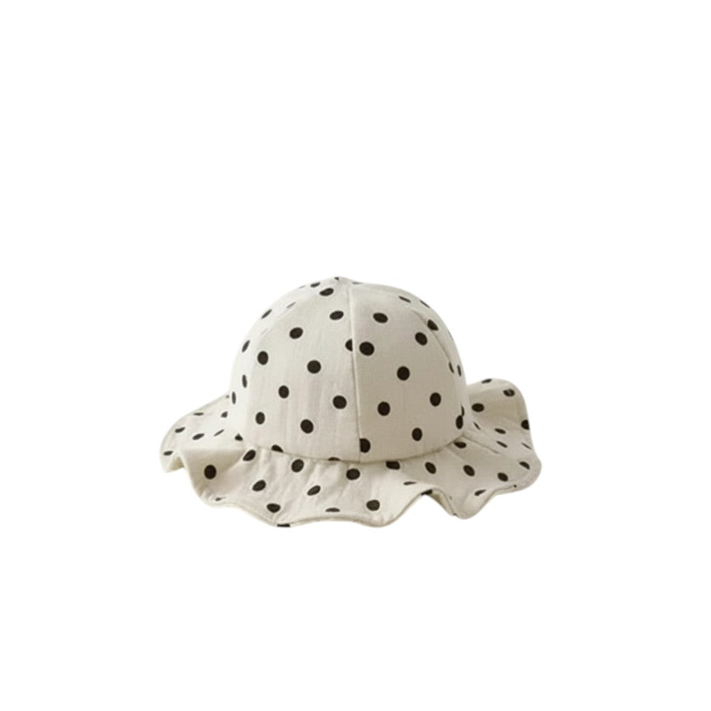 Peek Ah Boo cream baby sun hat with black polka dots and a wide, ruffled brim.