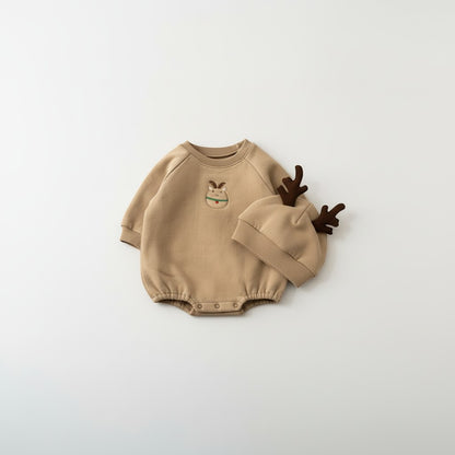 Peek Ah Boo tan baby bodysuit with Santa Claus embroidery and matching hat with antlers. Soft cotton blend for holiday comfort.