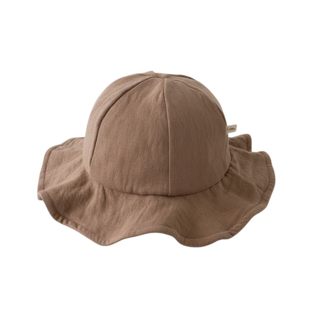 Peek Ah Boo wide brim baby sun hat in taupe, made from soft-touch breathable fabric with a decorative bow.
