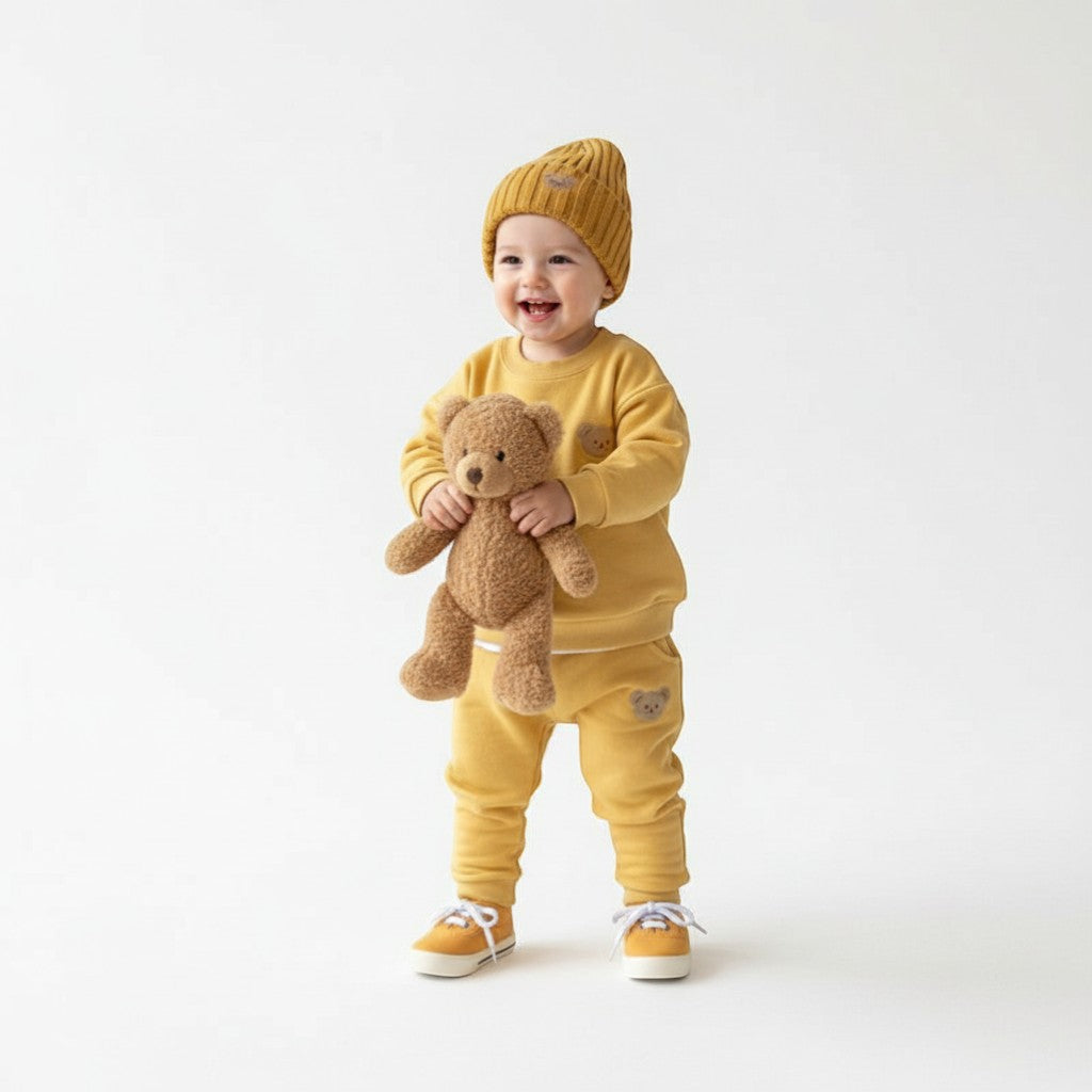 Peek Ah Boo yellow fleece baby tracksuit with embroidered bear detail and matching knit hat.